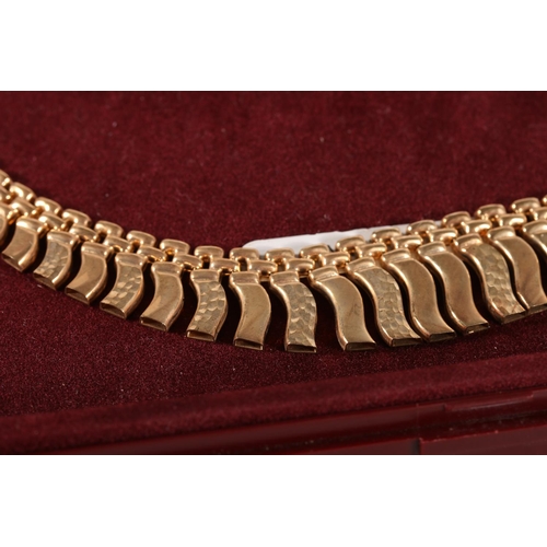 621 - 9ct gold necklace with graduated wavy panels, 44cm, 11.8g. 