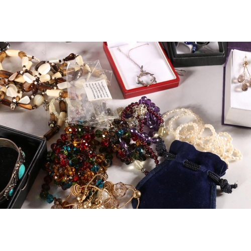 640 - Large quantity of costume jewellery to include Egyptian style ring and bangle, beads, necklaces, wat... 