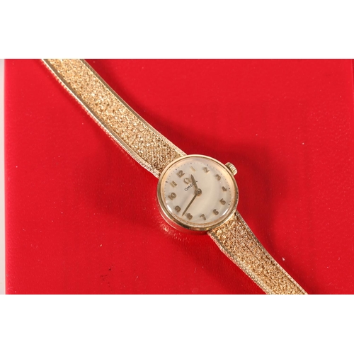 641 - Omega ladies wristwatch on 9ct gold strap, 17.8g gross. 