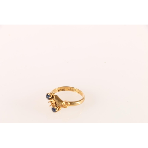 619 - 18ct gold cross over ring missing central stone and having swirls to shoulders, size J/K 3.2g. 