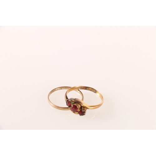 620 - 9ct gold cross over ring set with three red stones, size Q, and another wedding band, 3.2g. 