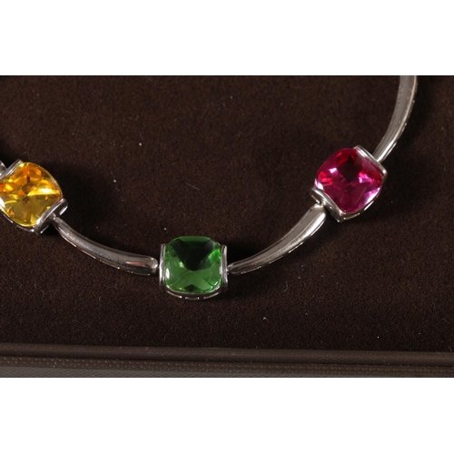 653 - Silver necklace 39cm, also silver tennis bracelet with green stone, two earrings and pendant. 