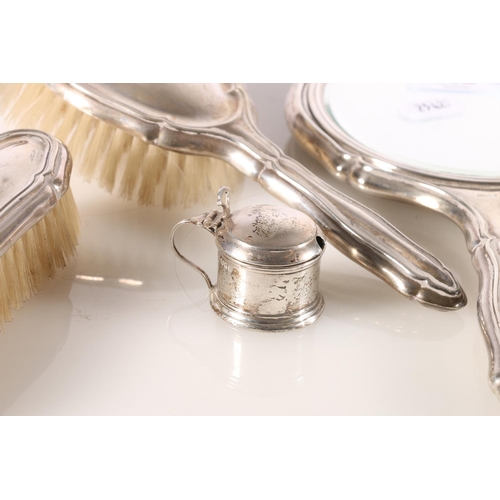 682 - Continental silver backed toilet set to include mirror, brushes, combs, etc, most marke 835. &n... 