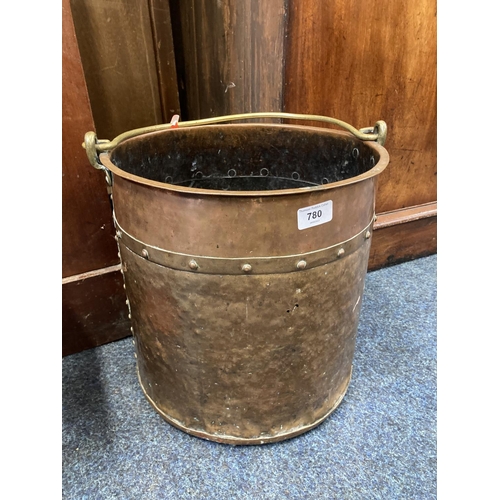 780 - Copper and brass studded log bin with swing handle, 36cm excluding handle.