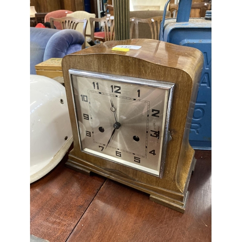 142 - Art deco mahogany mantle clock, 23cm. 