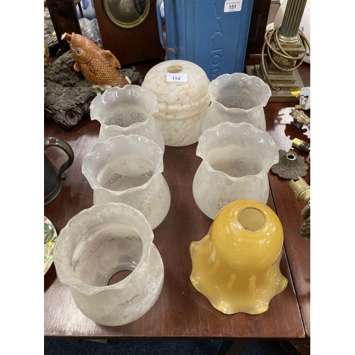 152 - Group of eight glass shades, 14cm. 