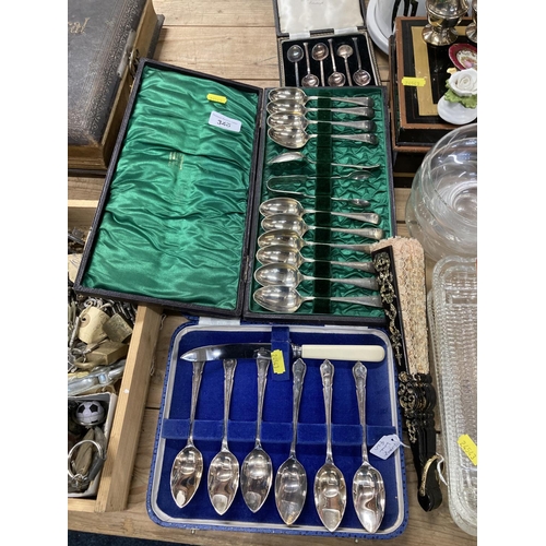 340 - Cased set of six silver-plated coffee spoons, and two other cased sets.