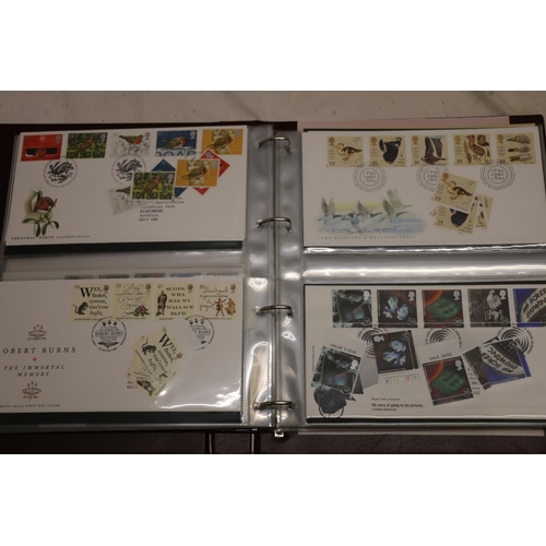 700 - GB mint stamps held in a Royal Mail first day covers album, including presentation packs and loose m... 