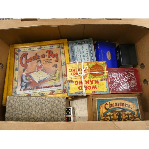 268 - Box of vintage board games to include snakes and ladders, Check a peg.