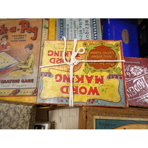 268 - Box of vintage board games to include snakes and ladders, Check a peg.