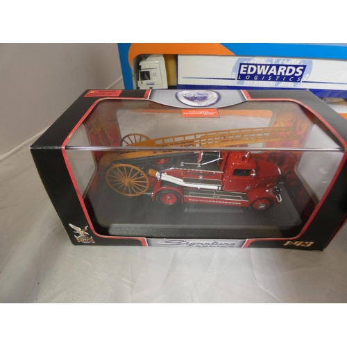 281 - Four die cast to include Edwards logistic by Tekno, Afc Mkii, Ford Thunderbird.