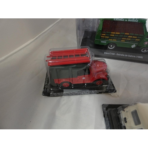 285 - Large collection of various boxed die cast taxis, police van, fire truck etc.