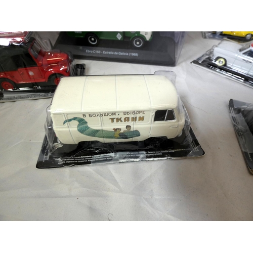 285 - Large collection of various boxed die cast taxis, police van, fire truck etc.