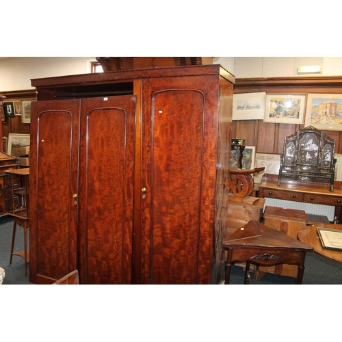 872 - Victorian mahogany three door section wardrobe, with two short and two long drawers to the interior,... 