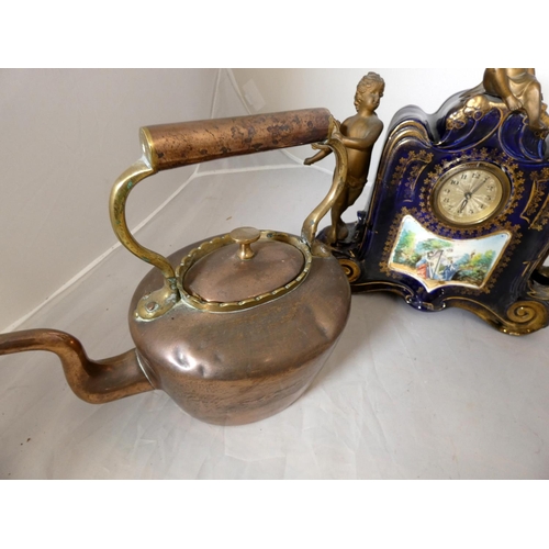 304 - Large Continental mantel clock surmounted by three angels and copper kettle.