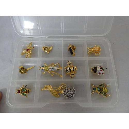 327 - Small box of ladies insect brooches.