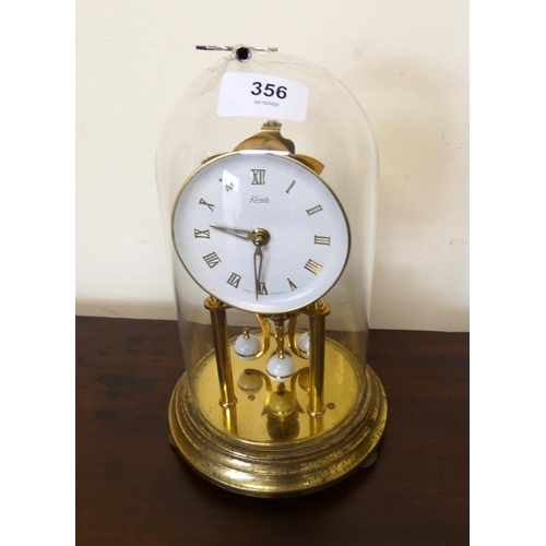 356 -  Kundo anniversary clock with glass.