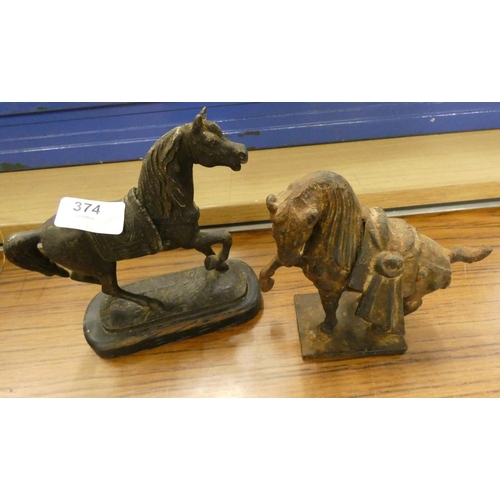 374 - Two cast horse figures.