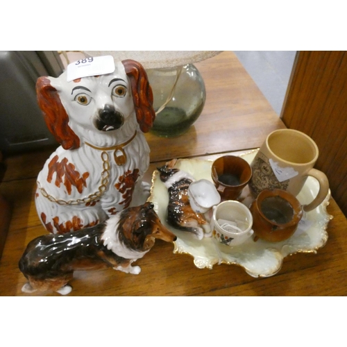 389 - Collection of decorative items to include Royal Doulton Collie, Staffordshire dog etc.