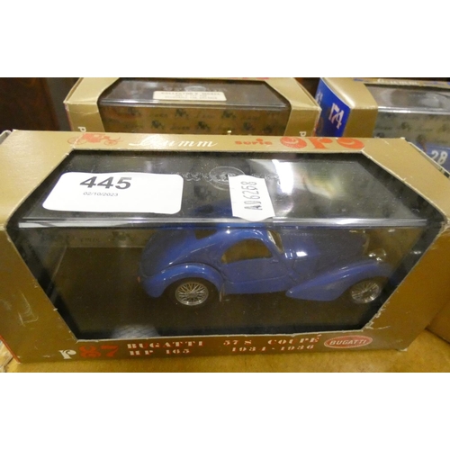 445 - Four die cast Bugati cars.