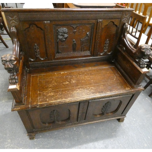 464 - Vintage oak monks bench with ornate carved lions for arms.