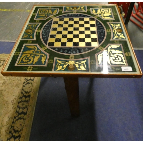 469 - Glass top folding games table.