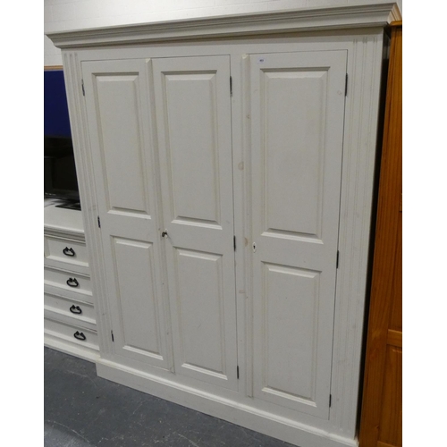 483 - Large painted three door wardrobe. 