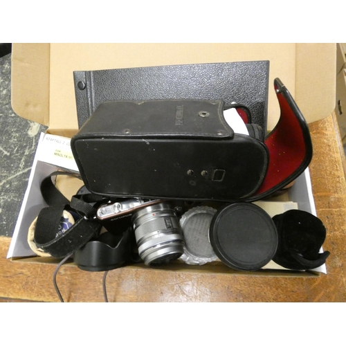 511 - Box of photographic items including lenses, Olympus Camera a/f.