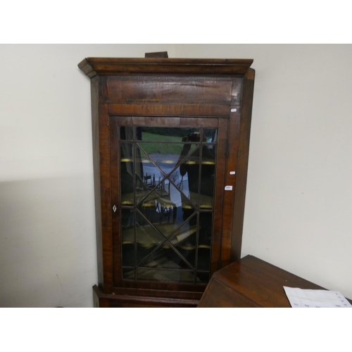 519 - Antique mahogany corner cupboard.