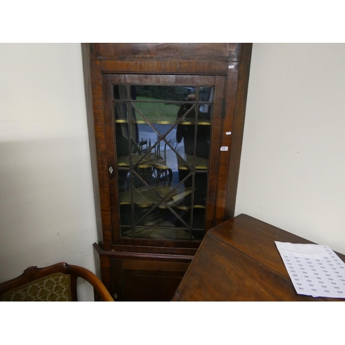 519 - Antique mahogany corner cupboard.