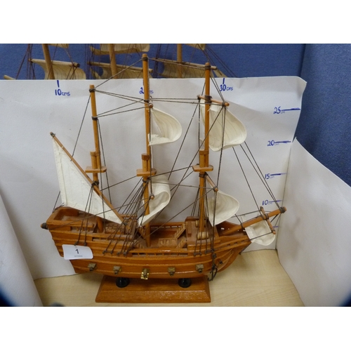 1 - Limited edition model of the HMS Victory, no. 189/1805, and four other model boats.