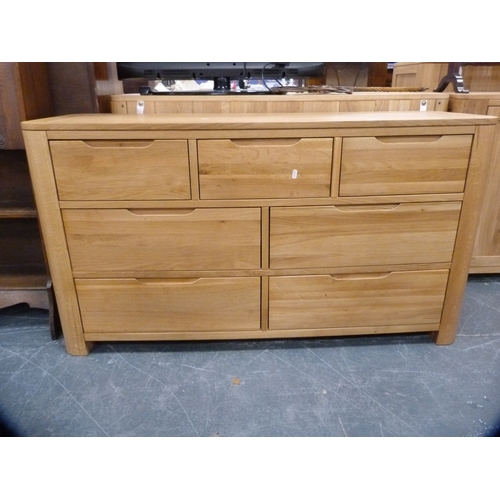 448 - Contemporary oak chest of seven drawers.