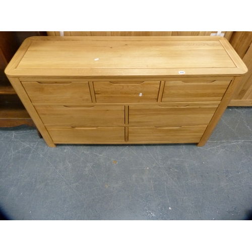 448 - Contemporary oak chest of seven drawers.