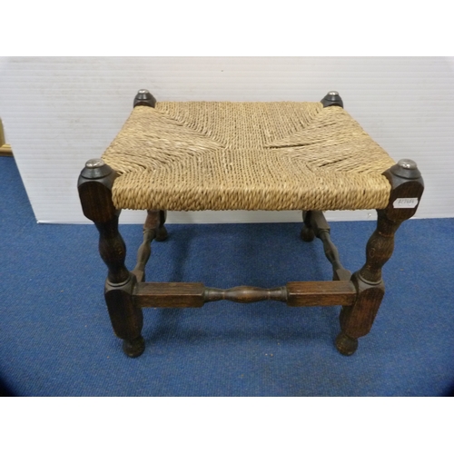 523 - Oak-framed stool, two wooden trays and a quantity of lampshades.