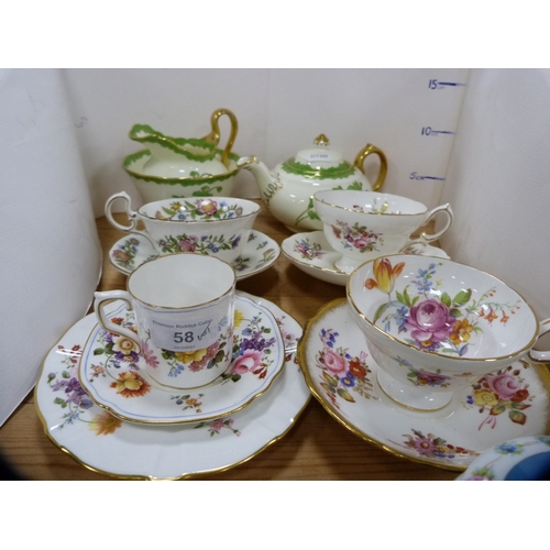 58 - Group of porcelain cabinet cups and saucers to include a Royal Crown Derby trio decorated with flora... 