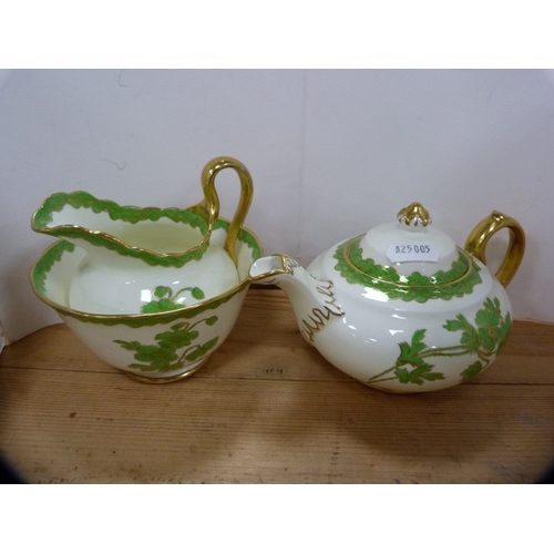 58 - Group of porcelain cabinet cups and saucers to include a Royal Crown Derby trio decorated with flora... 