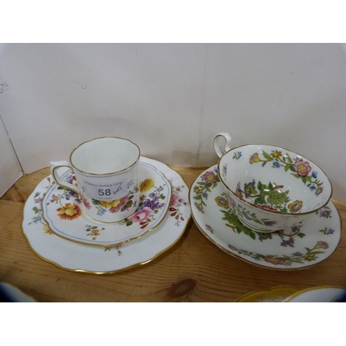 58 - Group of porcelain cabinet cups and saucers to include a Royal Crown Derby trio decorated with flora... 