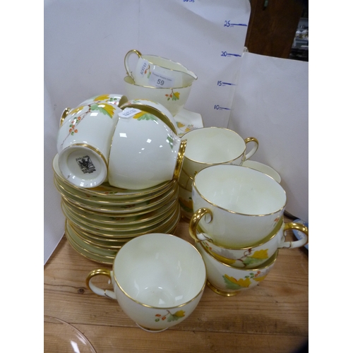 59 - Paragon part tea set with leaf decoration.