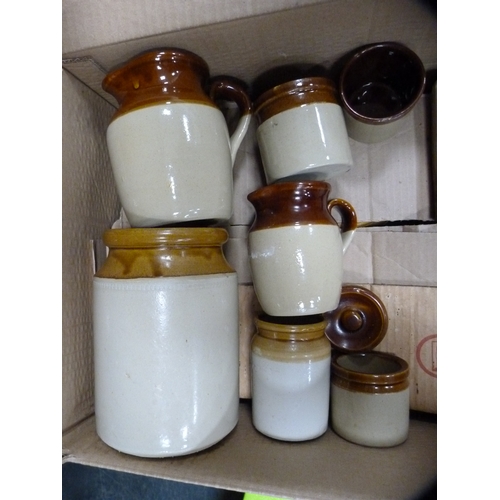 65 - Carton containing stoneware kitchenalia to include jugs, bowls etc.