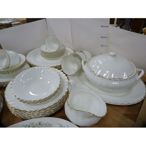 68 - Wedgwood 'Westbury' pattern part dinner set, and a Wedgwood 'Gold Chelsea' pattern part dinner set.