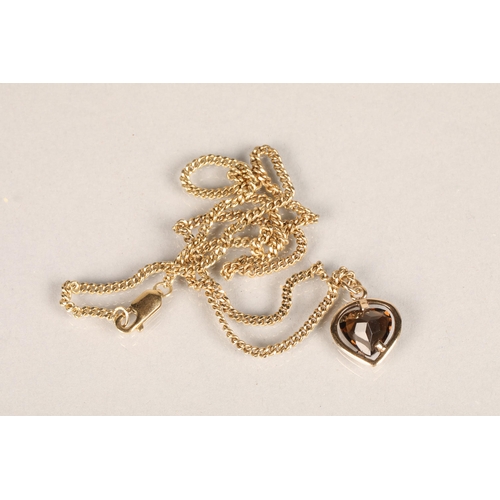 99 - Ladies 9 ct gold heart shaped pendant with chain.total weight 8.9 grams