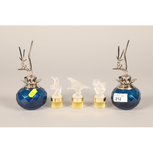 212 - Pair of Van Cleef & Arpels perfume atomizers the tops in the form of a stylised seated figure, 1... 