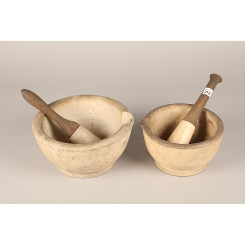 276 - Two large pestle and mortars