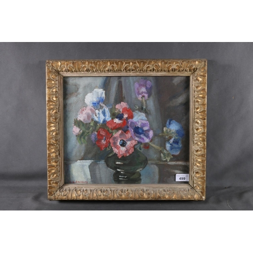 499 - C L CHARLES, Still life vase of flowers, oil on canvas, signed lower right, 28cm x 33cm, frame 37cm ... 