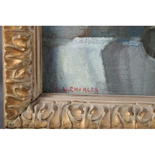 499 - C L CHARLES, Still life vase of flowers, oil on canvas, signed lower right, 28cm x 33cm, frame 37cm ... 