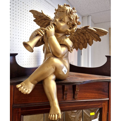 495 - Composition model of a seated cherub blowing a horn