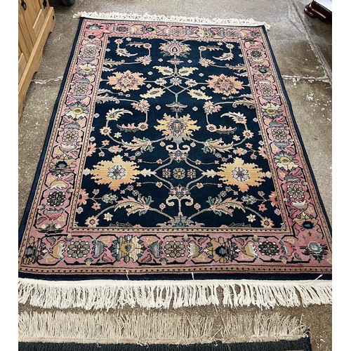 579 - Two pattern rugs