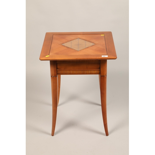 506 - Contemporary square lamp table raised on splayed supports