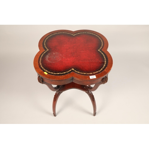 513 - Empire style two tier occasional table, the clover leaf shaped top with inset leather top, shelf bel... 