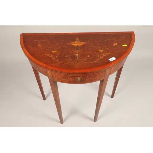 521 - 19th century inlaid demi lune table, the top with urn and foliate scrolls over frieze drawer on squa... 